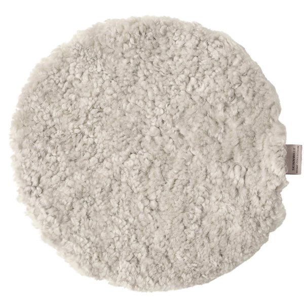 Skinnwille curly istuintyyny sand lampaantalja D34 cm - istuintyynyt Spazio